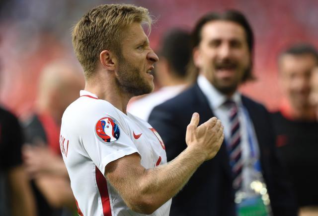 Poland's midfielder Jakub Blaszczykowski celebrates after his team's victory during the Euro 2016 round of sixteen football match Switzerland vs Poland at the Geoffroy Guichard stadium in Saint-Etienne. (AFP Photo) Poland's midfielder Jakub Blaszczykowski celebrates after his team's victory during the Euro 2016 round of sixteen football match Switzerland vs Poland at the Geoffroy Guichard stadium in Saint-Etienne. (AFP Photo)