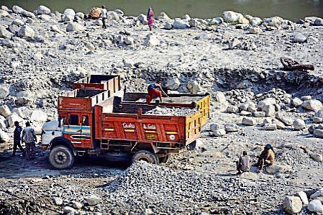 Illegal quarrying along the Pindar river. (Arvind Moudgil / HT Photo) Illegal quarrying along the Pindar river. (Arvind Moudgil / HT Photo)