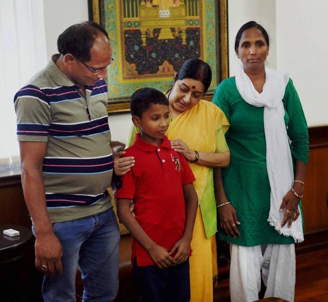 Sushma Swaraj with Sonu and his parents in New Delhi. (PTI)