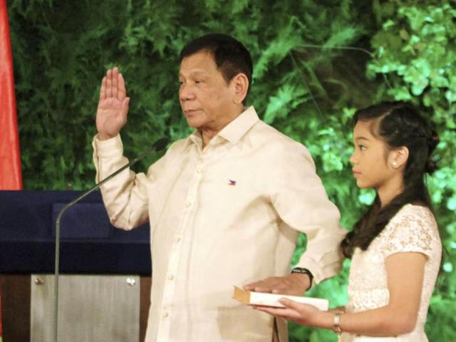 Duterte, 'the punisher', sworn in as Philippines' president