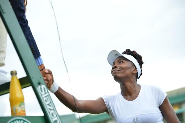 Venus Williams overcame a court controversy, a time violation warning and a second-set dip before getting past Greece's Maria Sakkari. (AFP) Venus Williams overcame a court controversy, a time violation warning and a second-set dip before getting past Greece's Maria Sakkari. (AFP)