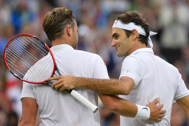 Switzerland's Roger Federer (R) shakes hands and ebraces Britain's Marcus Willis (L) at the net after Federer won their men's singles second round match on the third day of the 2016 Wimbledon Championships at The All England Lawn Tennis Club in Wimbledon, southwest London, on June 29, 2016. / AFP PHOTO / GLYN KIRK / RESTRICTED TO EDITORIAL USE (AFP) Switzerland's Roger Federer (R) shakes hands and ebraces Britain's Marcus Willis (L) at the net after Federer won their men's singles second round match on the third day of the 2016 Wimbledon Championships at The All England Lawn Tennis Club in Wimbledon, southwest London, on June 29, 2016. / AFP PHOTO / GLYN KIRK / RESTRICTED TO EDITORIAL USE (AFP)