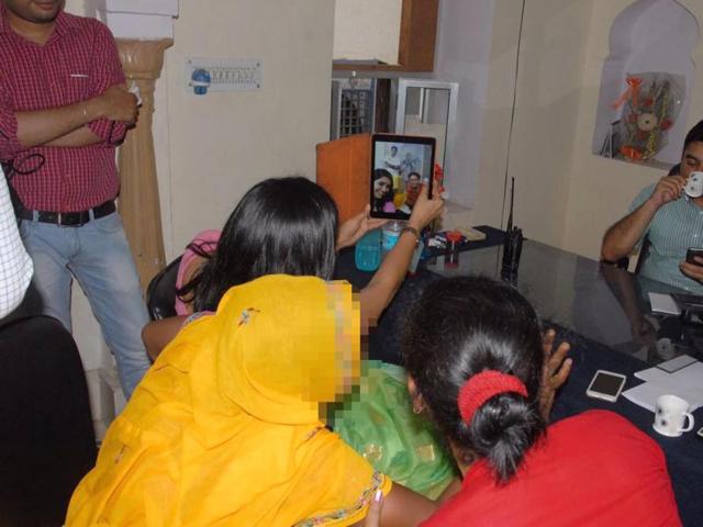 This was one of the photos circulating on social media showing Soumya Gurjar (holding her phone) clicking a selfie with a rape victim (face blurred) and the chairperson of the Rajasthan Women’s Commission.