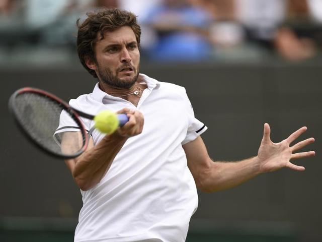 Simon blamed tournament supervisors who insisted the match should continue despite a brief period of light rain.(AFP)