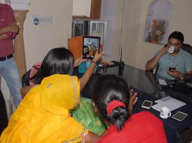 This was one of the photos circulating on social media showing Soumya Gurjar (holding her phone) clicking a selfie with a rape victim (face blurred) and the chairperson of the Rajasthan Women’s Commission. This was one of the photos circulating on social media showing Soumya Gurjar (holding her phone) clicking a selfie with a rape victim (face blurred) and the chairperson of the Rajasthan Women’s Commission.