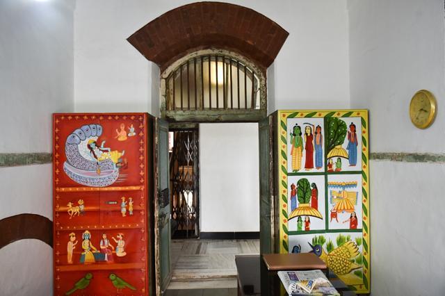 Godrej cupboards painted with images of deities at the entrance to the prayer room (Photo: Aalok Soni/HT)