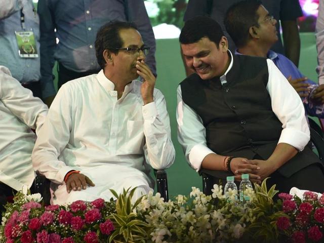 CM Devendra Fadnavis and Shiv Sena chief Uddhav Thackeray at the plantation drive, at Mahim on Friday. (Arijit Sen/HT) CM Devendra Fadnavis and Shiv Sena chief Uddhav Thackeray at the plantation drive, at Mahim on Friday. (Arijit Sen/HT)
