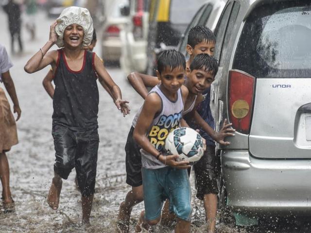 Football with friends during monsoon — the kids have gotten it right. (Kunal Patil/HT photo ) Football with friends during monsoon — the kids have gotten it right. (Kunal Patil/HT photo )