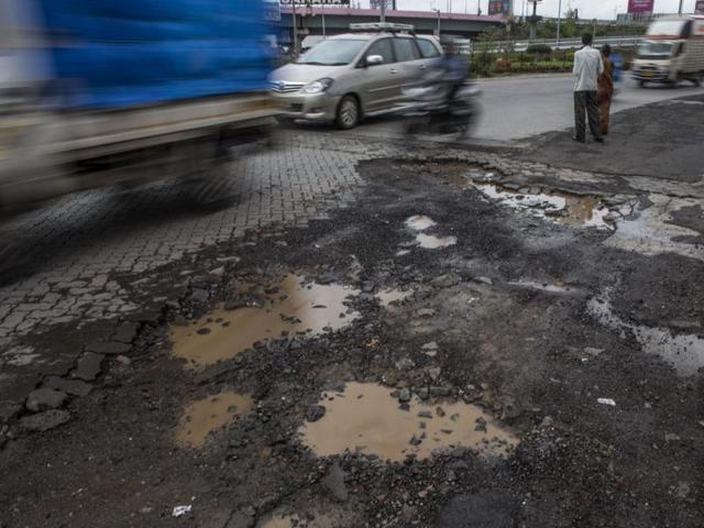 Mahim Causeway Junction: The paver blocks on this road near the station have come off within a few spells. The authorities need to repair it in time, as it is a major connecting link to the western suburbs. (Satish Bate/ Hindustan Times)