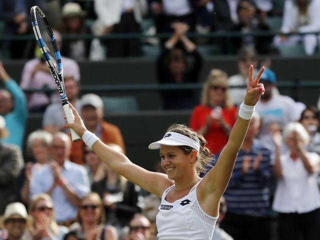 Jana Cepelova celebrates her win over Muguruza. (AP Photo) 