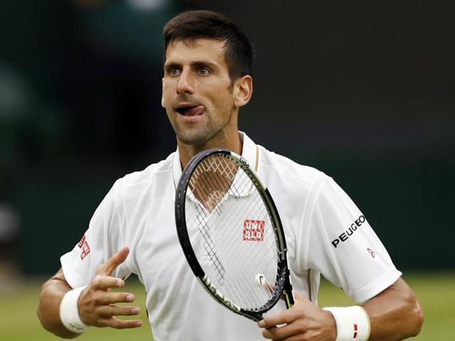Serbia's Novak Djokovic celebrates beating France's Adrian Mannarino in their men's singles match. (AFP Photo) Serbia's Novak Djokovic celebrates beating France's Adrian Mannarino in their men's singles match. (AFP Photo)