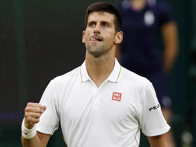 Novak Djokovic of Serbia celebrates after beating Adrian Mannarino of France in their men's singles match of the Wimbledon Tennis Championships in London. (AP Photo) Novak Djokovic of Serbia celebrates after beating Adrian Mannarino of France in their men's singles match of the Wimbledon Tennis Championships in London. (AP Photo)