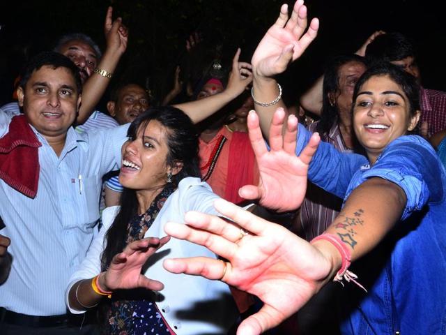 Devotees dance on religious beats as the first batch prepares to leave for Amarnath Yatra, in Jammu on Friday. (Nitin Kanotra/HT Photo)