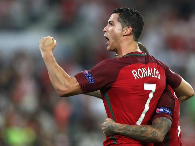 Cristiano Ronaldo celebrates after winning the Euro 2016 quarterfinal football match against Poland.  (AFP Photo) 