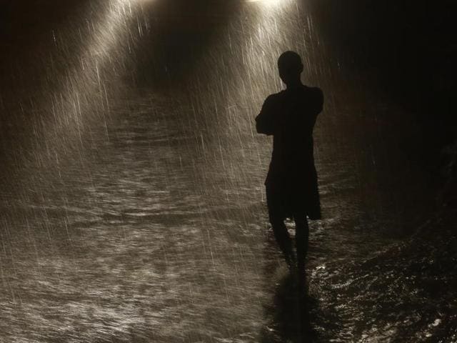 Fancy a little walk on a flooded street? (AP) Fancy a little walk on a flooded street? (AP)