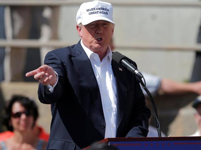 US Republican presidential candidate Donald Trump speaks at a campaign town hall meeting outside a closed Osram Sylvania manufacturing facility in Manchester, New Hampshire. (Reuters Photo) US Republican presidential candidate Donald Trump speaks at a campaign town hall meeting outside a closed Osram Sylvania manufacturing facility in Manchester, New Hampshire. (Reuters Photo)