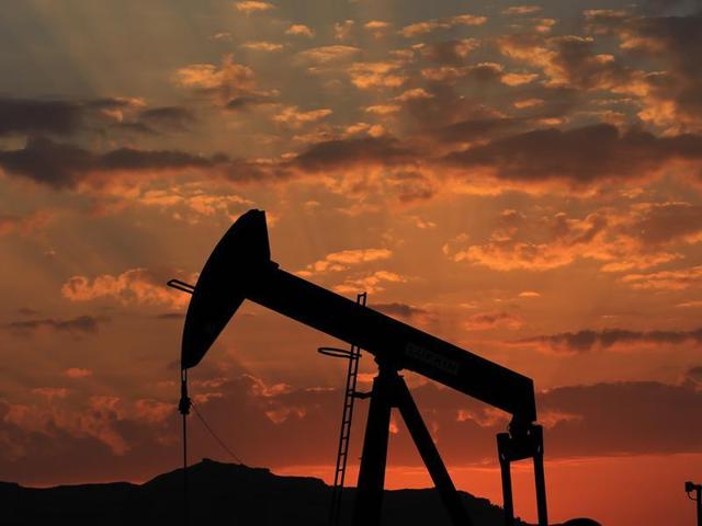An oil pump at sunset in the desert oil fields of Sakhir, Bahrain. (AP File Photo) An oil pump at sunset in the desert oil fields of Sakhir, Bahrain. (AP File Photo)