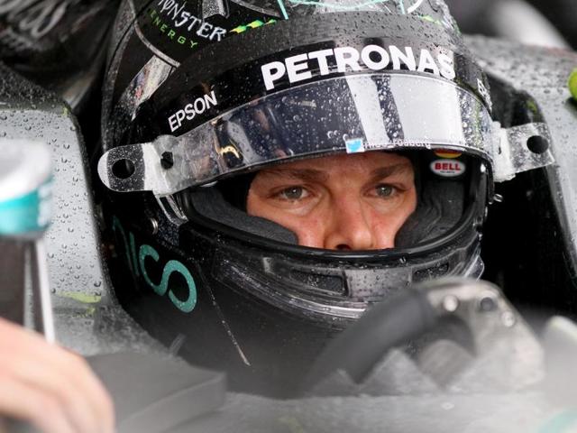 Mercedes driver Nico Rosberg of Germany gets a pit service during the second free practice session. (AP Photo) Mercedes driver Nico Rosberg of Germany gets a pit service during the second free practice session. (AP Photo)