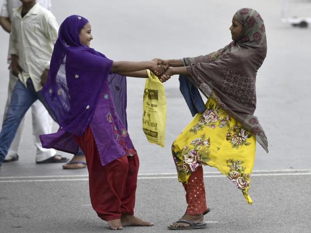 New Delhi, India - July 01, 2016, Muslims girls playing due to Friday Namaz at Geeta Colony in New Delhi on Friday New Delhi, India, July 01, 2016. (Photo by Arun Sharma / Hindustan Times) (Arun Sharma/HT PHOTO) New Delhi, India - July 01, 2016, Muslims girls playing due to Friday Namaz at Geeta Colony in New Delhi on Friday New Delhi, India, July 01, 2016. (Photo by Arun Sharma / Hindustan Times) (Arun Sharma/HT PHOTO)