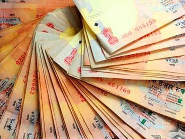 Dealers said strong foreign fund inflows and a higher opening of the domestic equity market gave rupee more strength against dollar on Friday.(File Photo)