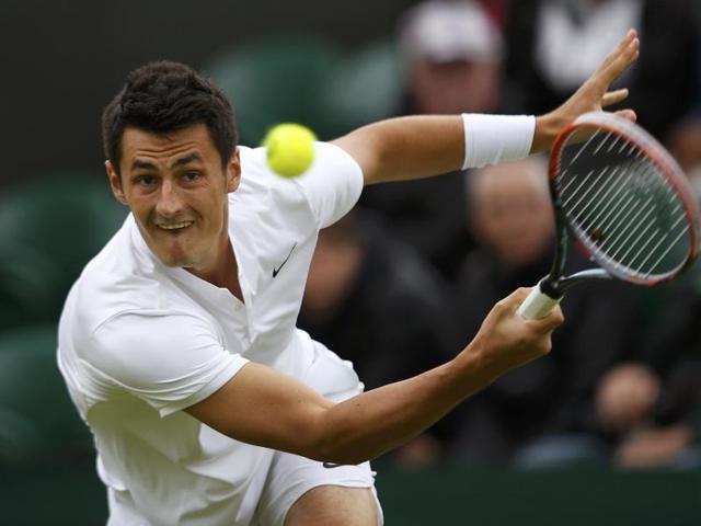 Bernard Tomic celebrates his win over Radu Albot of Moldova. (AP) Bernard Tomic celebrates his win over Radu Albot of Moldova. (AP)