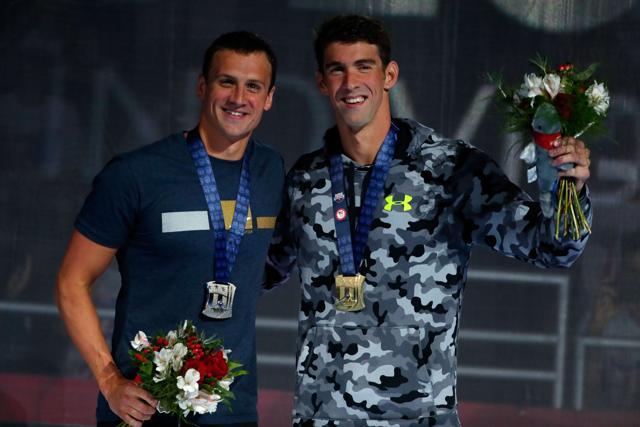 Michael Phelps (right) and Ryan Lochte (left) of the United States participate in the medal ceremony for the men's 200-metre individual medley during Olympic team swimming trials at CenturyLink Center in Omaha. (AFP Photo)
