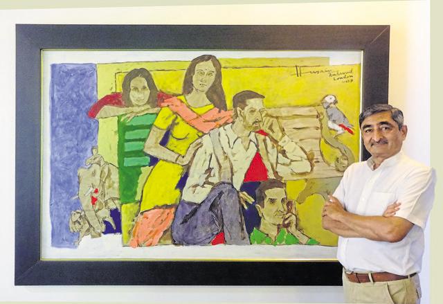Anil Relia, an art collector in Ahmedabad, with the family portrait painted by Husain in 2007 (Photo courtesy: Anil Relia) Anil Relia, an art collector in Ahmedabad, with the family portrait painted by Husain in 2007 (Photo courtesy: Anil Relia)