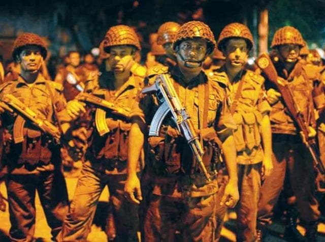 Bangladeshi security personnel cordon off the area after a group of gunmen attacked a restaurant popular with foreigners in a diplomatic zone of Dhaka. (REUTERS) Bangladeshi security personnel cordon off the area after a group of gunmen attacked a restaurant popular with foreigners in a diplomatic zone of Dhaka. (REUTERS)