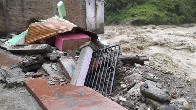 A house flattened by heavy rainfall at Maithana village in Chamoli district. (HT Photo) A house flattened by heavy rainfall at Maithana village in Chamoli district. (HT Photo)