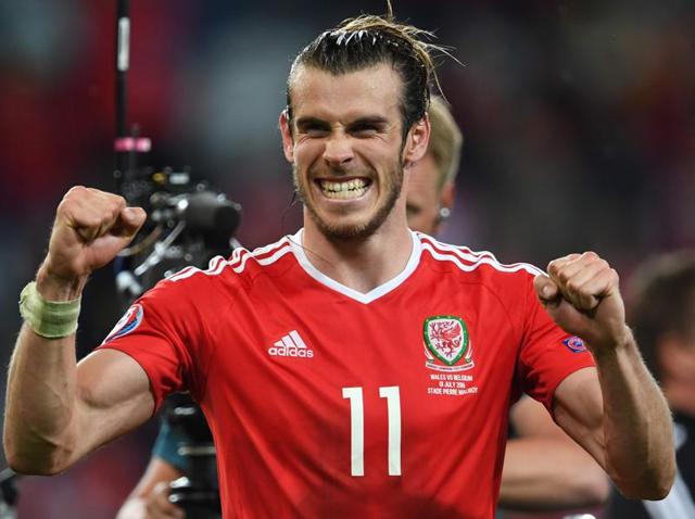 Wales' forward Gareth Bale (centre) celebrates with teammates at the end of the Euro 2016 quarterfinal football match between Wales and Belgium at the Pierre-Mauroy stadium in Villeneuve-d'Ascq near Lille. (AFP Photo) Wales' forward Gareth Bale (centre) celebrates with teammates at the end of the Euro 2016 quarterfinal football match between Wales and Belgium at the Pierre-Mauroy stadium in Villeneuve-d'Ascq near Lille. (AFP Photo)