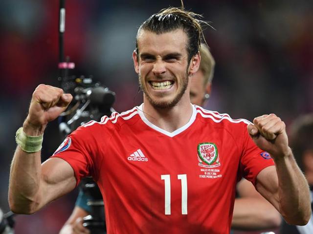 Wales' forward Gareth Bale celebrates after the Euro 2016 quarterfinal victory over Belgium. (AFP Photo) 