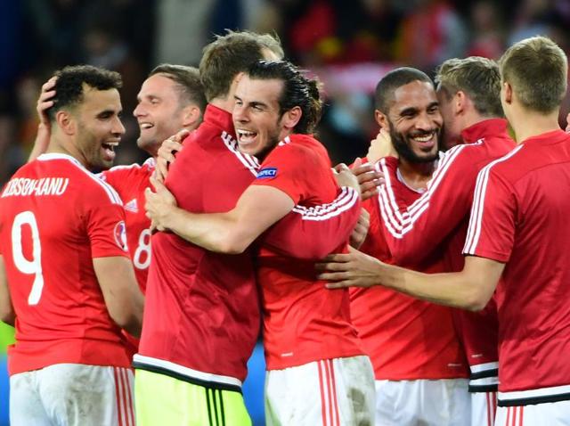 Wales' forward Gareth Bale (centre) celebrates with team mates after the Euro 2016 quarterfinal football match against Belgium at the Pierre-Mauroy stadium in Villeneuve-d'Ascq near Lille. (AFP Photo) Wales' forward Gareth Bale (centre) celebrates with team mates after the Euro 2016 quarterfinal football match against Belgium at the Pierre-Mauroy stadium in Villeneuve-d'Ascq near Lille. (AFP Photo)