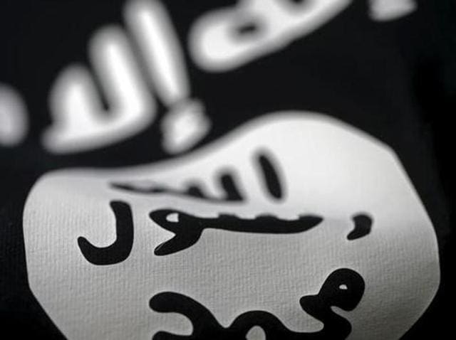 An Islamic State flag is seen in this picture illustration. A coalition air strike near Mosul in Iraq has killed two IS military leaders, the Pentagon said on Friday. (Reuters) An Islamic State flag is seen in this picture illustration. A coalition air strike near Mosul in Iraq has killed two IS military leaders, the Pentagon said on Friday. (Reuters)
