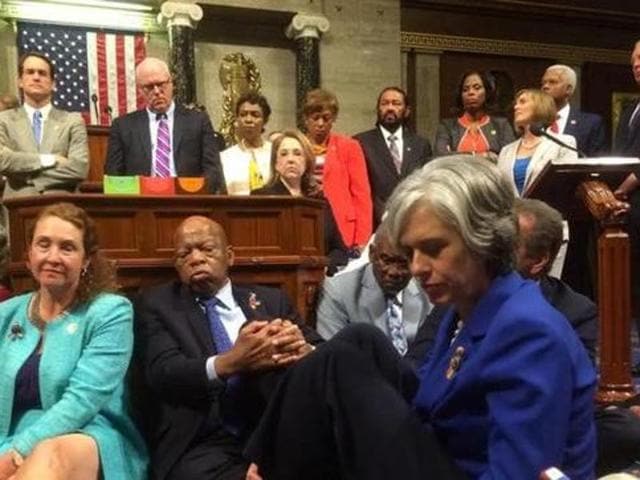 A photo shot and tweeted from the floor of the US House of Representatives Democratic members of the House staging a sit-in to demand action on common sense gun legislation. (Reuters) A photo shot and tweeted from the floor of the US House of Representatives Democratic members of the House staging a sit-in to demand action on common sense gun legislation. (Reuters)