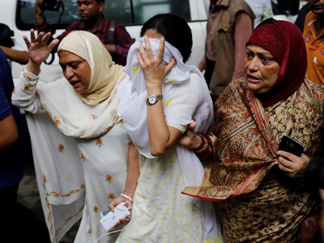 People react near the Holey Artisan restaurant after Islamist militants attacked the upscale cafe in Dhaka.(REUTERS) People react near the Holey Artisan restaurant after Islamist militants attacked the upscale cafe in Dhaka.(REUTERS)