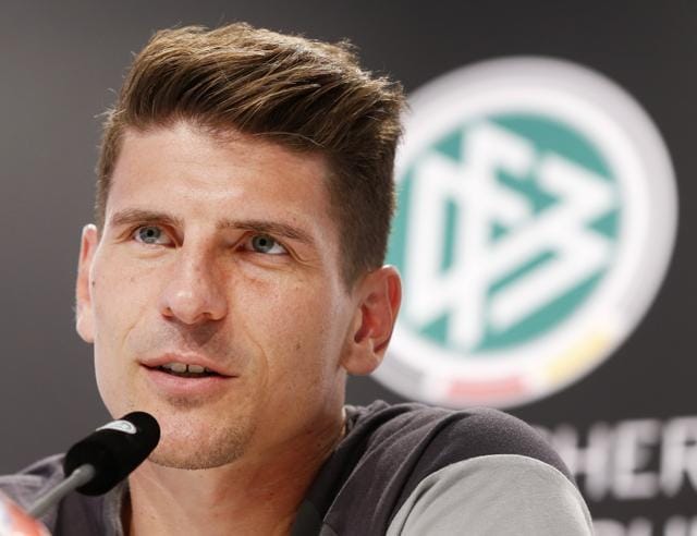 Mario Gomez speaks during a news conference after a training session of the German national football team. (AP Photo) Mario Gomez speaks during a news conference after a training session of the German national football team. (AP Photo)