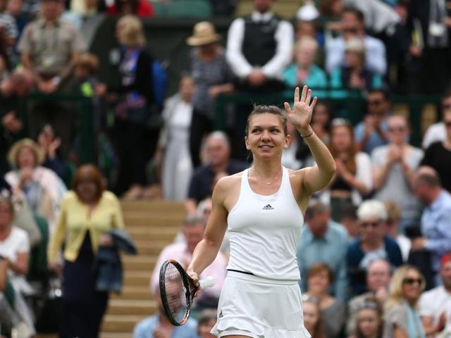 Romania's Simona Halep celebrates beating Netherlands' Kiki Bertens. (AFP) Romania's Simona Halep celebrates beating Netherlands' Kiki Bertens. (AFP)