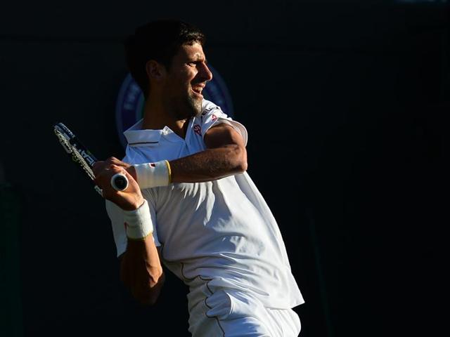 Serbia's Novak Djokovic returns to Sam Querrey during their men's singles third round match. (AFP Photo) 