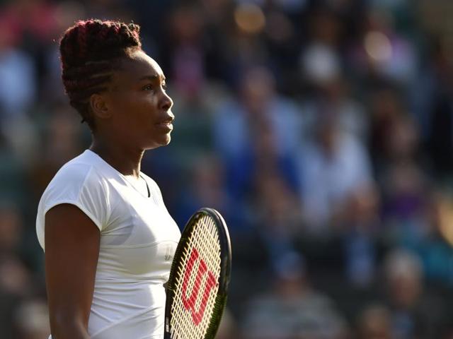 Venus Williams pauses as she plays Russia's Daria Kasatkina during their women's singles third round match. (AFP Photo) 