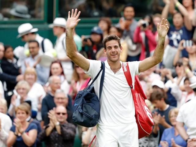 Argentina's Juan Martin del Potro celebrates beating Switzerland's Stan Wawrinka during their men's singles second round match on the fifth day of the 2016 Wimbledon Championships at The All England Lawn Tennis Club in Wimbledon, London. (AFP Photo) 