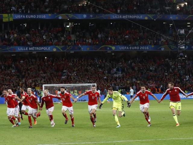 Wales players celebrate after defeating Belgium 3-1 in their Euro 2016 quarterfinal clash.  (Reuters Photo) 