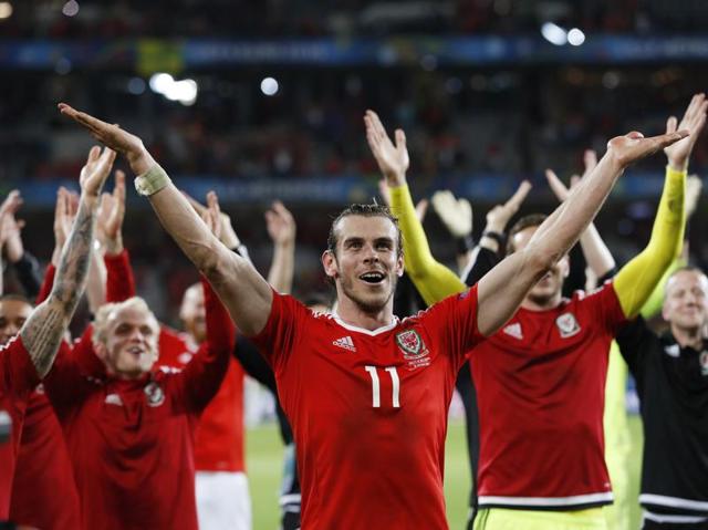 Wales' forward Gareth Bale and teammates celebrate at full time after thumping World No. 2 Belgium 3-1 in the Euro 2016 quarterfinals.  (Reuters Photo) 