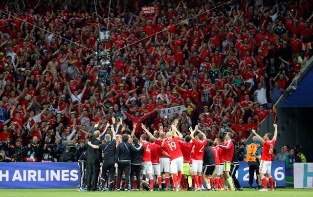Wales players celebrate at the end of their game against Belgium atStade Pierre-Mauroy, Lille, France. (Reuters Photo) Wales players celebrate at the end of their game against Belgium atStade Pierre-Mauroy, Lille, France. (Reuters Photo)