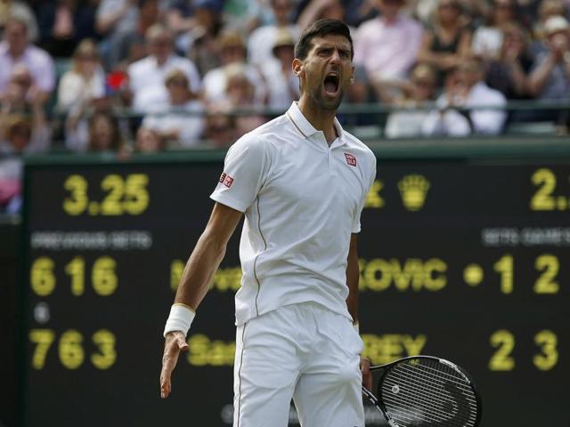 Djokovic reacts after winning the third set. (REUTERS) Djokovic reacts after winning the third set. (REUTERS)