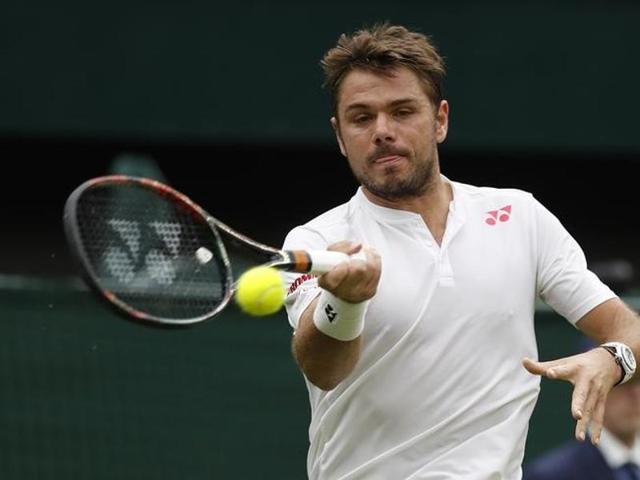 Switzerland's Stan Wawrinka plays against Argentina's Juan Martin Del Potro at Wimbledon.  (Reuters Photo) 