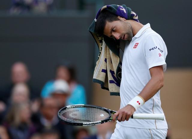 Serbia's Novak Djokovic reacts during his match against USA's Sam Querrey. (Reuters Photo) Serbia's Novak Djokovic reacts during his match against USA's Sam Querrey. (Reuters Photo)