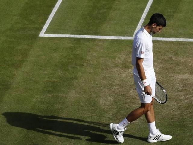 A disappointed Djokovic after his loss. (Reuters) A disappointed Djokovic after his loss. (Reuters)