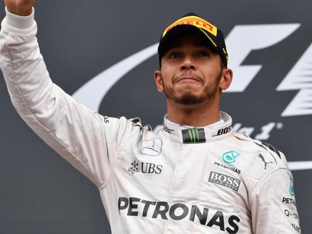Mercedes Formula One driver Lewis Hamilton of Britain drives during the race. (Reuters Photo) Mercedes Formula One driver Lewis Hamilton of Britain drives during the race. (Reuters Photo)