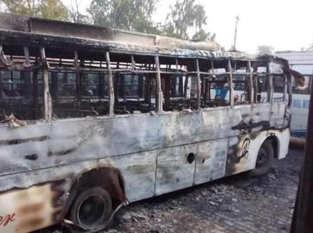 A private bus burnt at Malerkotla bus stand.(HT Photo)