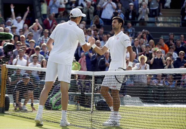 Sam Querrey of the US (left) shakes hands with Novak Djokovic after beating him in their men's singles match on day six of the Wimbledon Tennis Championships in London. (AP Photo) Sam Querrey of the US (left) shakes hands with Novak Djokovic after beating him in their men's singles match on day six of the Wimbledon Tennis Championships in London. (AP Photo)